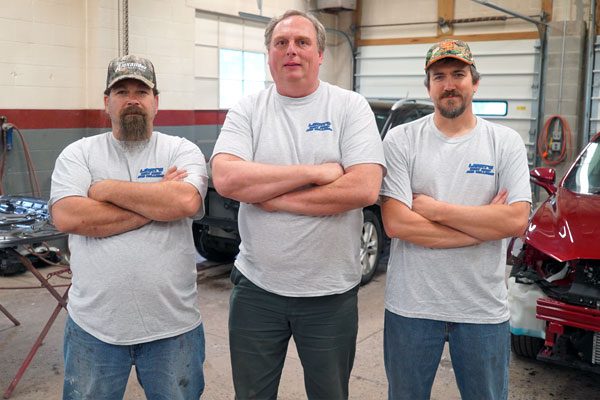 Larry Sholly and Larry's Body Shop staff